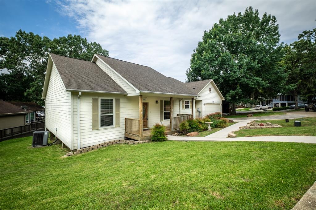 220 HARBOUR ROW DRIVE, COLDSPRING, TX 77331 A Action Realty